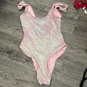 Frankie’s Bikinis Pink Pearlescent One Piece in Size Medium.